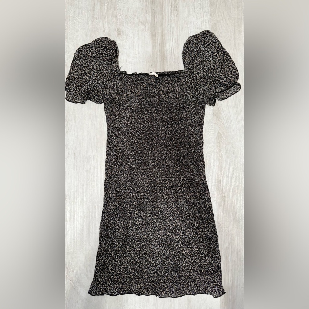 Black floral short dress. Very stretchy. Size medium.